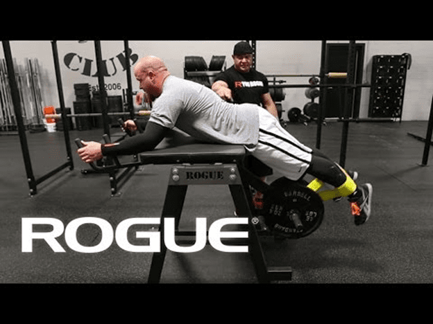 A man is doing an exercise on the bench.